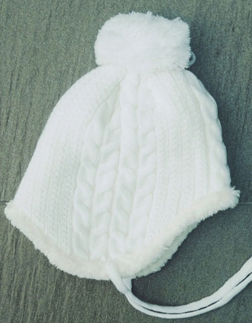 cream bobble hat